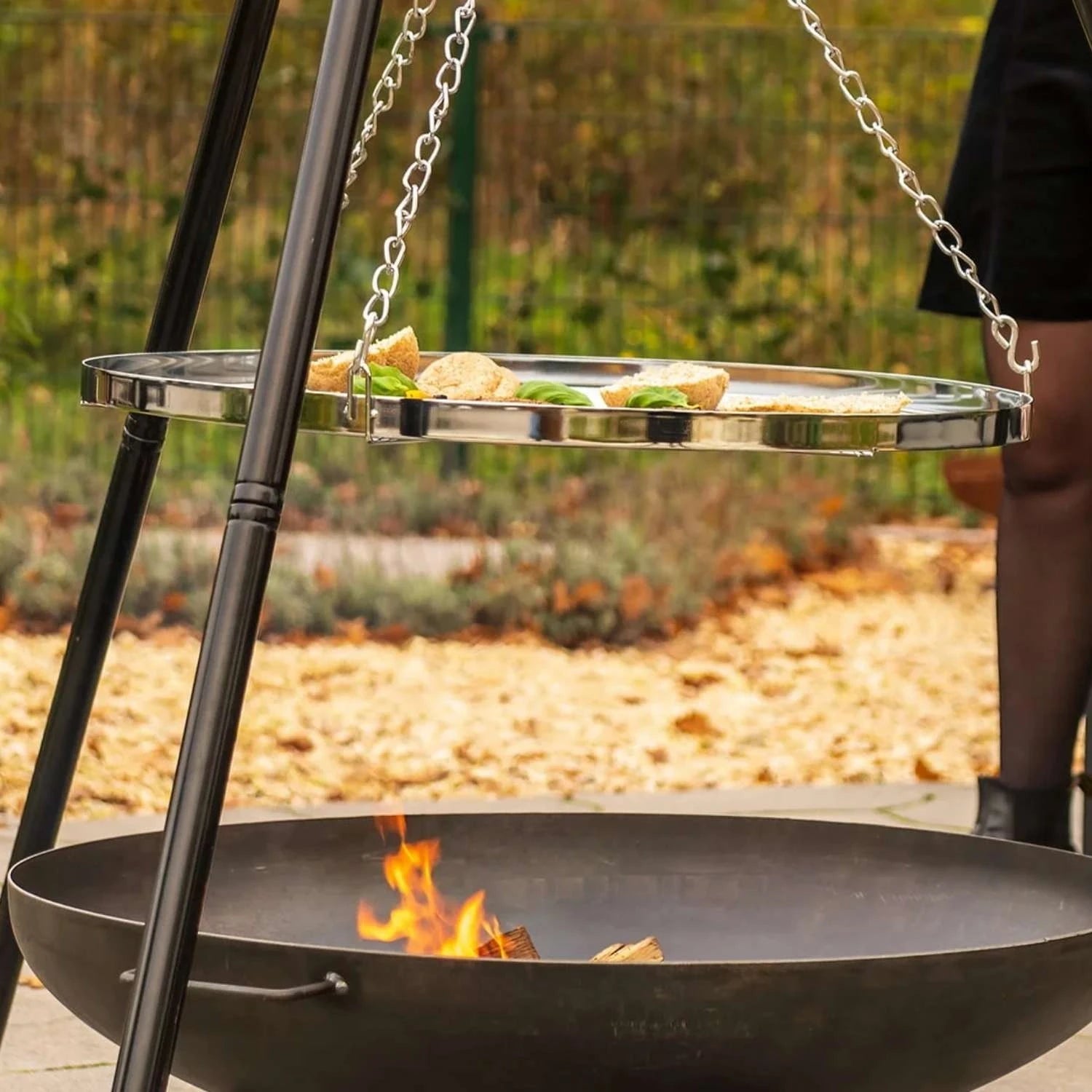 BBQ tripod, designed for grilling over an open flame with stability and versatility
